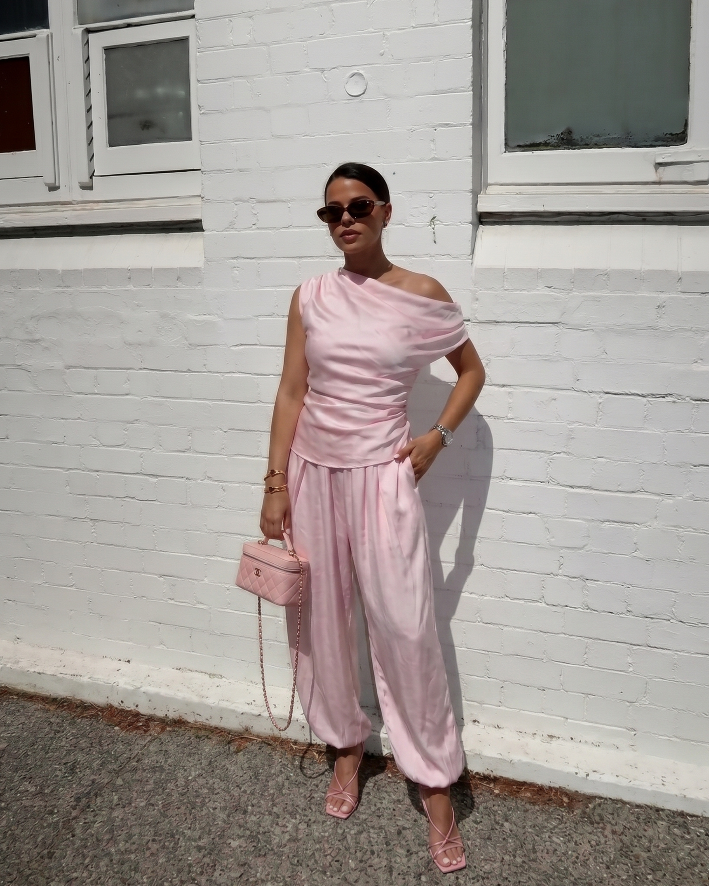 Woman’s Asymmetrical 2 two Pieces set One-Shoulder Draped Patchwork Top and Balloon Pants .